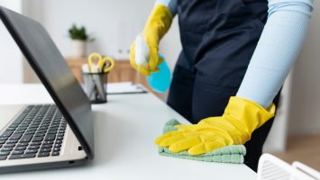 person-taking-care-office-cleaning_23-2149374450